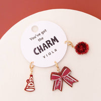 Charm Set Featuring Pom Pom, Megaphone, and Glittered Bow: Red White