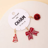 Charm Set Featuring Pom Pom, Megaphone, and Glittered Bow: Burgundy White