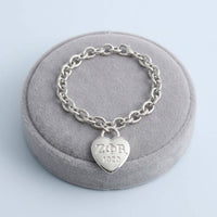 ZPB Silver 1920 Legacy Heart Lock Chain Bracelet: Silver / Rhodium / 8 inches