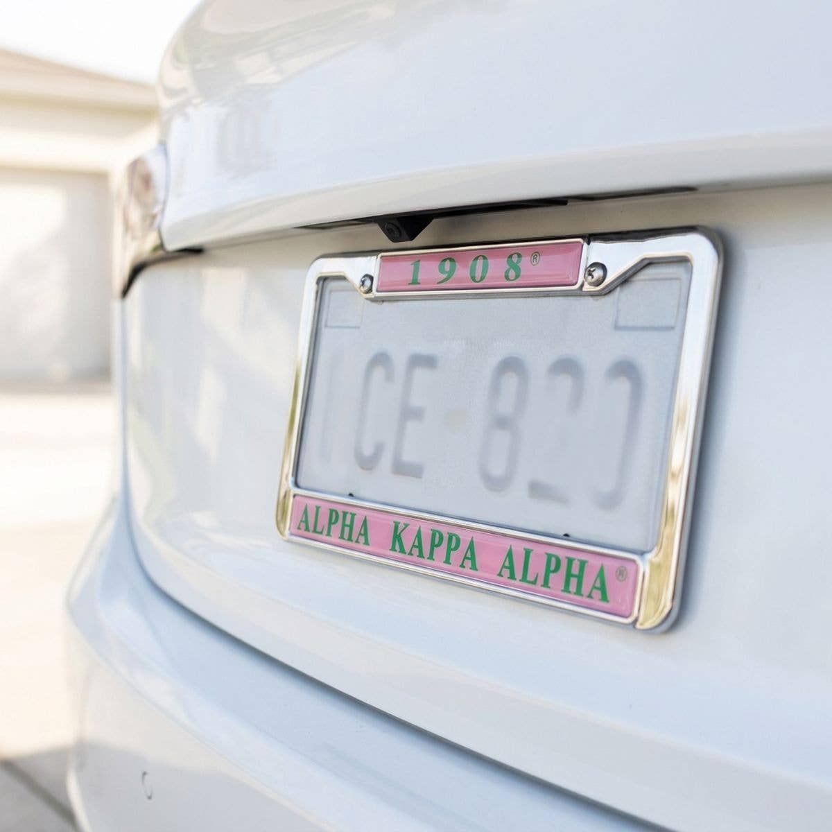 Alpha Kappa Alpha 1908 License Plate Frame: Pink and Green / Rhodium / 6.25 x 12.25 inches