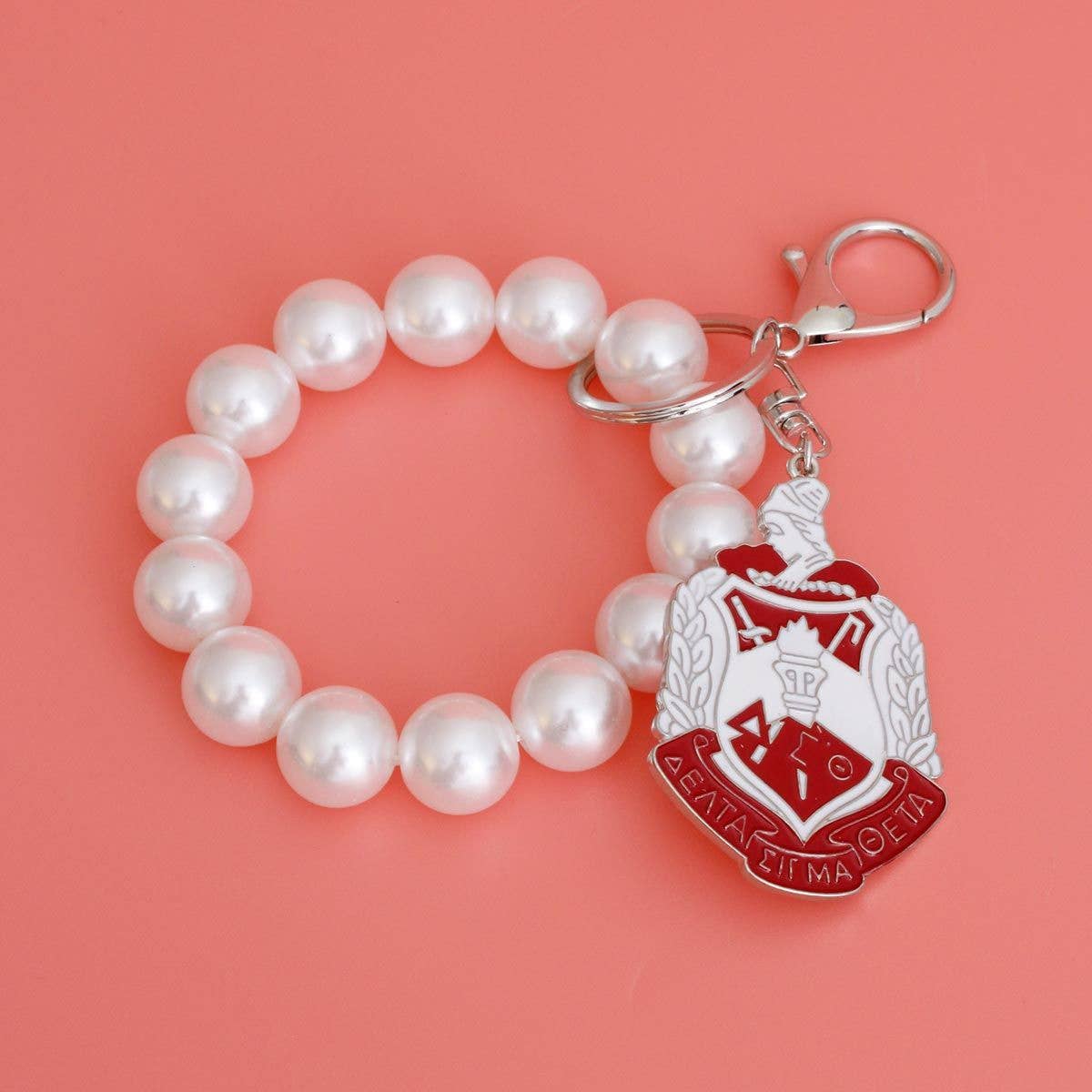 White Red Delta Shield Pearl Keychain: 7.75 x 1.65 inches / White / Rhodium